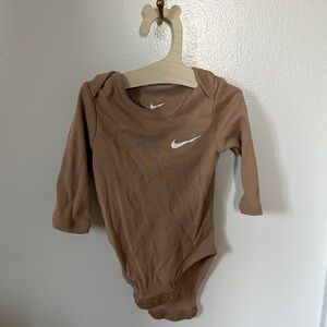 5/$25 Nike Tan Long Sleeve Baby Bodysuit 68-74cm or 6-9m